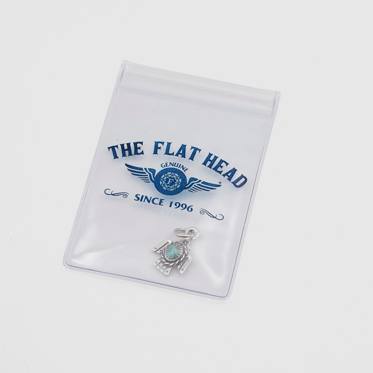 The Flat Head Thunderbird Turquoise Stone Sterling Pendant