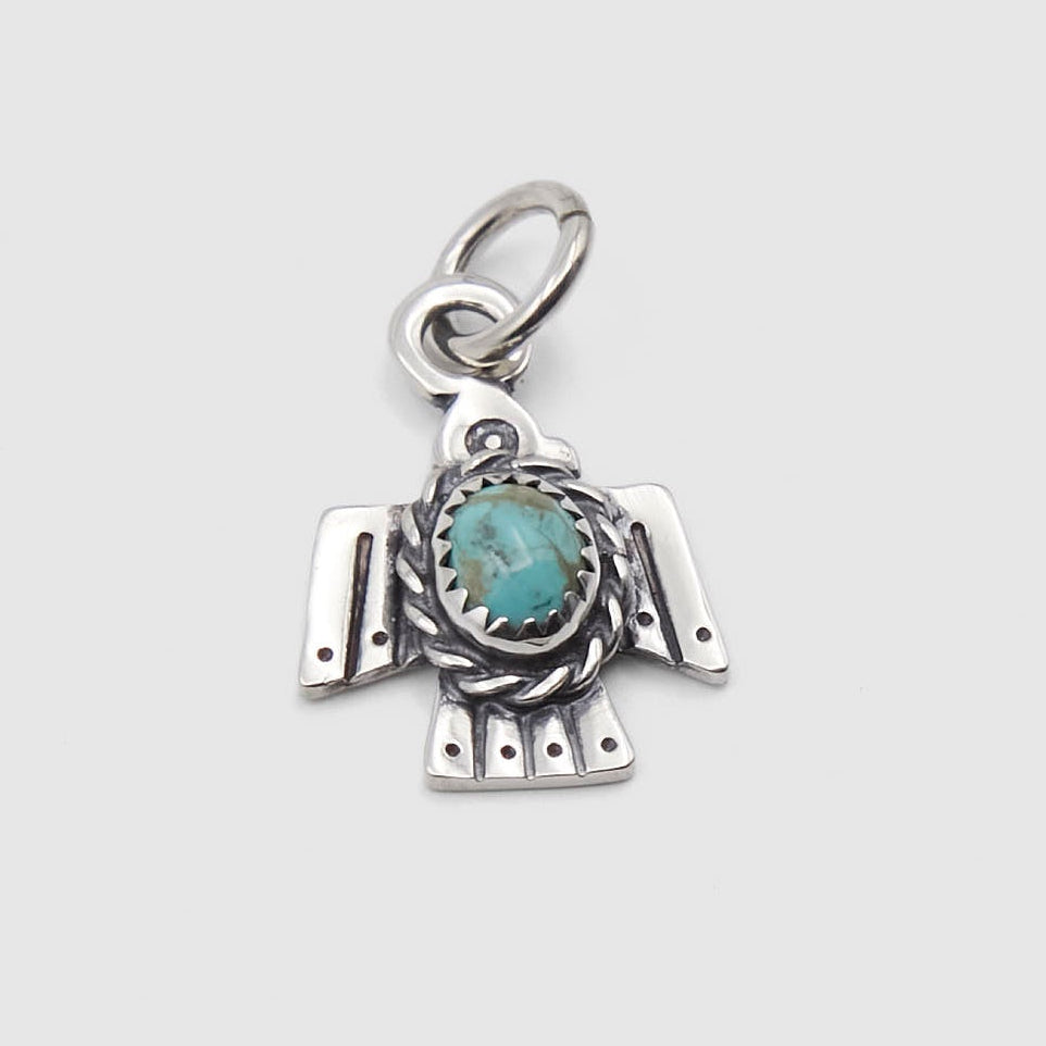 The Flat Head Thunderbird Turquoise Stone Sterling Pendant