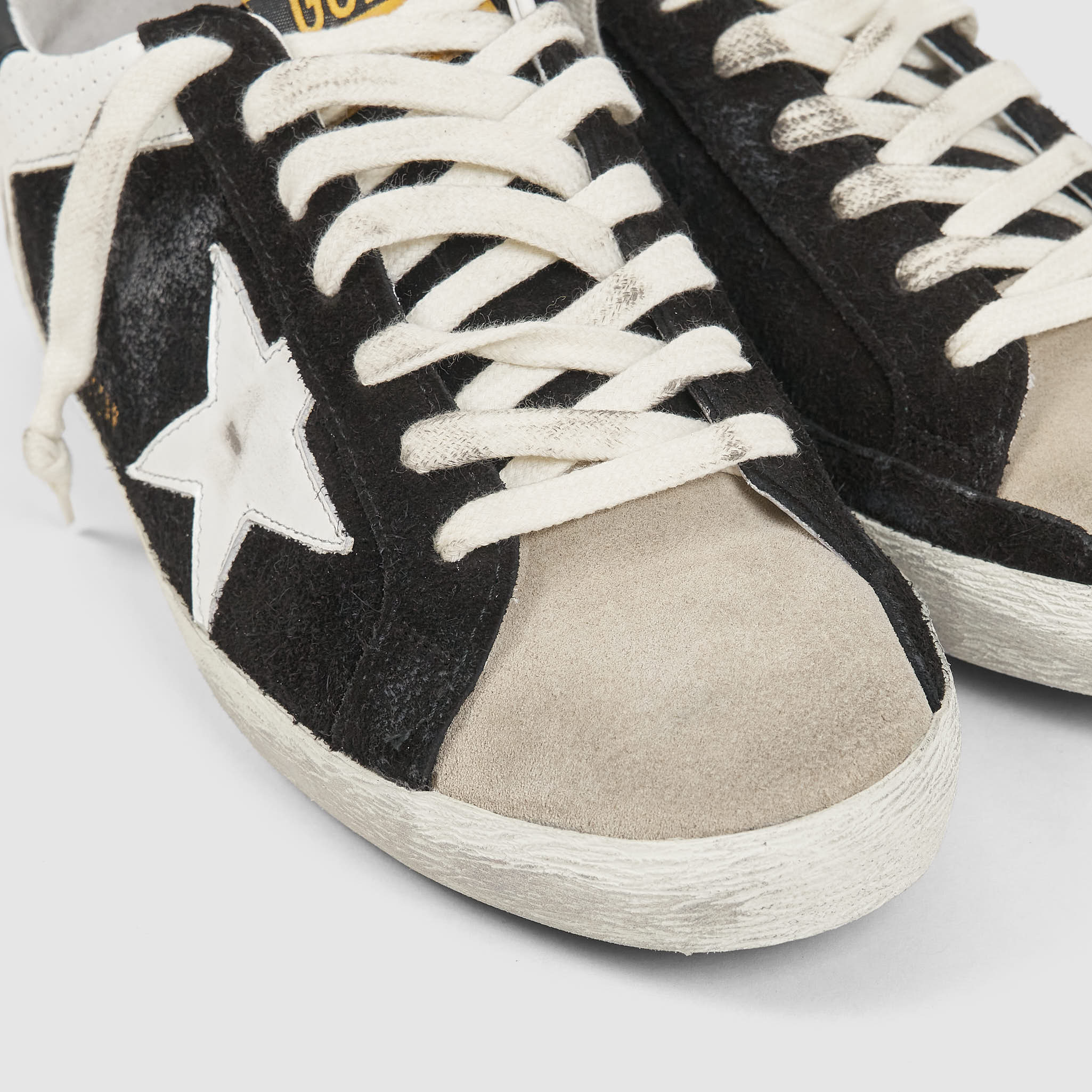 Superstar suede black on sale and white