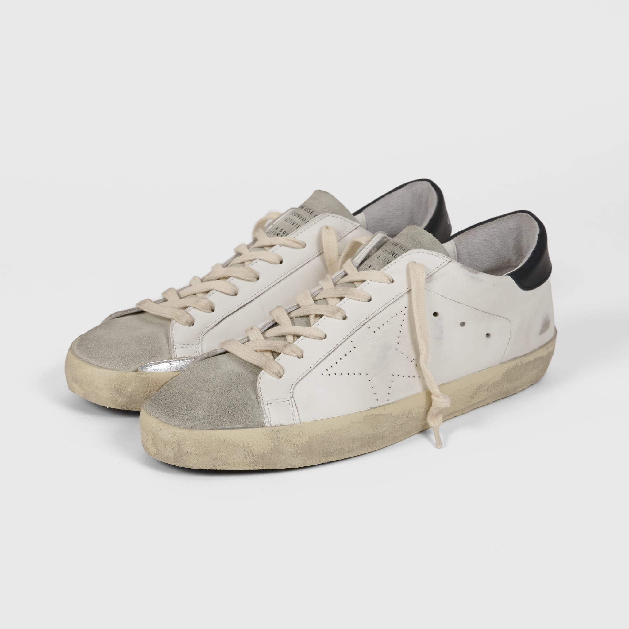 Golden goose white and black superstar sneakers discount