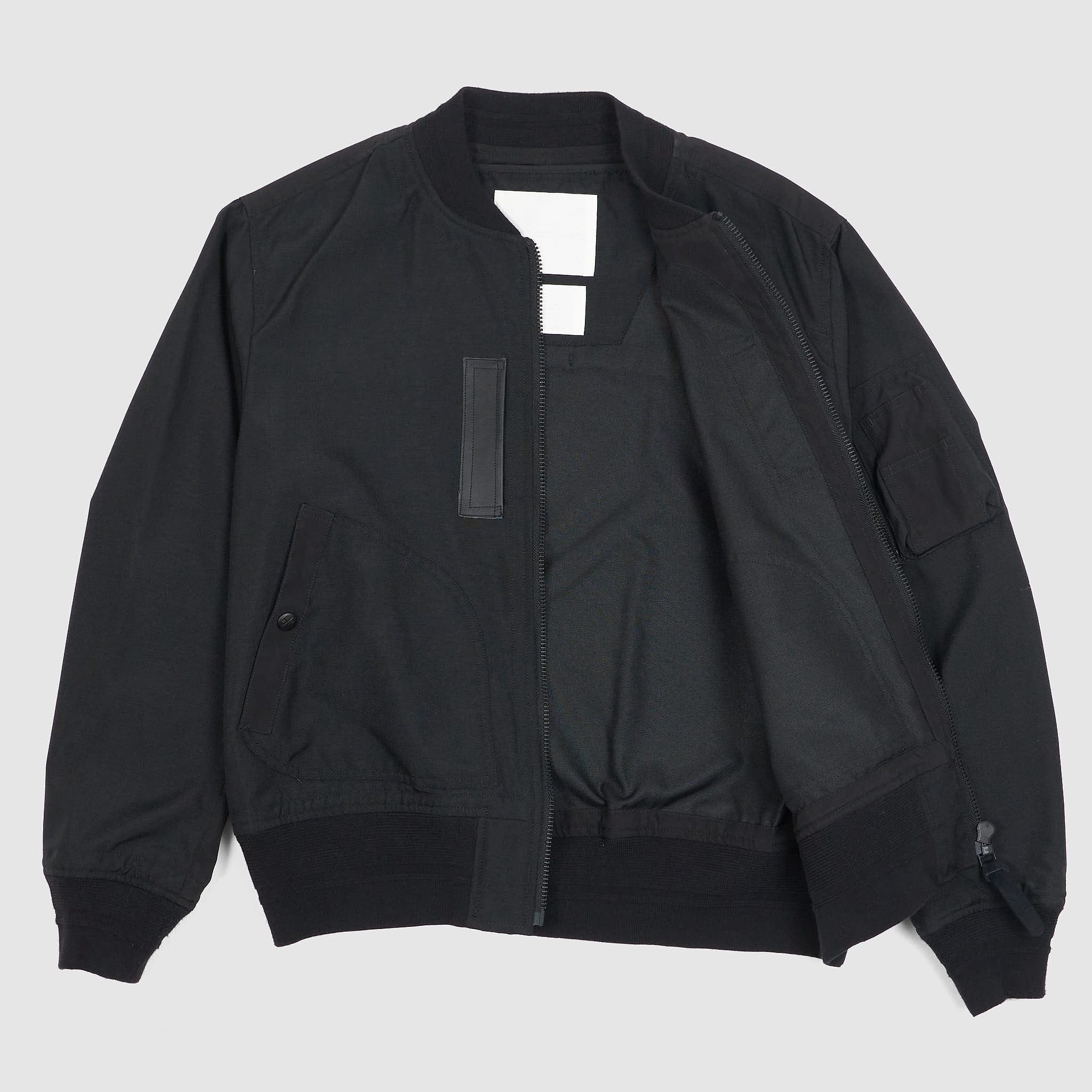 White mountaineering jacket store