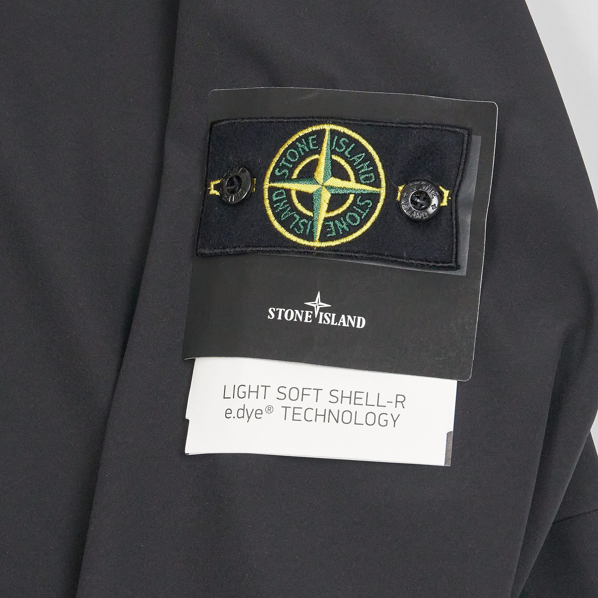 Stone island badge shell deals jacket